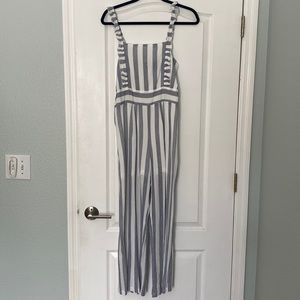 Beautiful light grey and white striped jumpsuit wide legged